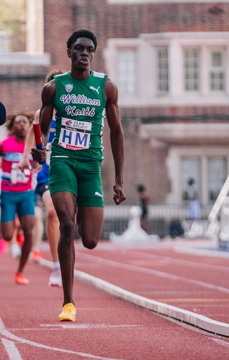 Procore Management student-athlete running a relay leg